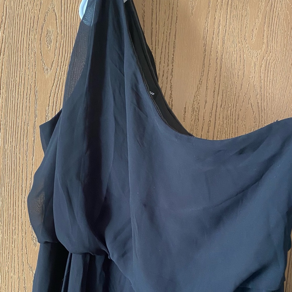 This black beautiful long dress is very flattering off to one shoulder dress